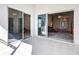 Spacious patio with sliding glass doors offering views of the interior living spaces at 904 Harbor Town Dr, Venice, FL 34292