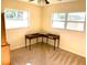 Cozy bedroom with water-view windows, ideal for hobbies or as a home office space with warm, neutral tones at 919 Key Way, Nokomis, FL 34275