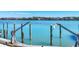 Multiple boat lifts on a private dock, offering easy access to the expansive waterfront at 919 Key Way, Nokomis, FL 34275