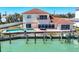 Beautiful waterfront home with a private dock, boat lift, and a refreshing swimming pool at 919 Key Way, Nokomis, FL 34275