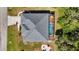 Aerial view of the home showcasing the pool and well-maintained landscaping at 951 Sea Fox Rd, Venice, FL 34293
