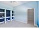 Bedroom features custom built-in shelving and closet at 951 Sea Fox Rd, Venice, FL 34293