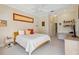 Cozy bedroom with neutral walls, plush carpet and overhead lighting at 951 Sea Fox Rd, Venice, FL 34293