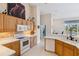 Spacious kitchen with white appliances, tile floors and lots of counter space at 951 Sea Fox Rd, Venice, FL 34293