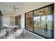 Relax on the balcony with lovely views of the water and blue sky at 990 Bird Bay Way # 258, Venice, FL 34285