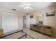 Spacious bedroom with neutral walls, white closet doors, and tile floors, ready for personalization at 990 Bird Bay Way # 258, Venice, FL 34285