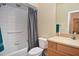 Clean bathroom with shower-tub combo and sleek vanity at 1000 Gardens Edge Dr # 1023, Venice, FL 34285