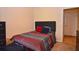 Comfortable bedroom with neutral walls and a full closet for ample storage at 1000 Gardens Edge Dr # 1023, Venice, FL 34285