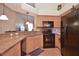 Well-equipped kitchen with granite countertops, stainless steel appliances, and ample cabinet space at 1000 Gardens Edge Dr # 1023, Venice, FL 34285