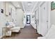 Clean and well-maintained office hallway leading to a treatment room at 10064 Cozy Grove Dr, Venice, FL 34293