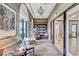 Inviting library space with bookshelves and comfortable seating, offering a quiet retreat at 10064 Cozy Grove Dr, Venice, FL 34293