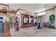 View of an organized pro shop, featuring display cases filled with golf attire, bags, and other golf-related merchandise at 10064 Cozy Grove Dr, Venice, FL 34293