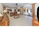 Expansive living area with open layout, connecting to kitchen and outdoor patio at 101 Portofino Dr, North Venice, FL 34275