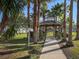 Outdoor gazebo with seating and lush surroundings, offering a perfect spot for relaxation or social gathering at 1041 Capri Isles Blvd # 224, Venice, FL 34292