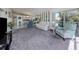 Open-concept living area with dining area and seamless access to kitchen at 1041 Capri Isles Blvd # 224, Venice, FL 34292