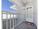 A welcoming front porch boasts a beach-themed entrance with a charming doormat at 1041 Capri Isles Blvd # 224, Venice, FL 34292