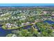 Scenic aerial shot of the community with lakes, golf course, and attractive residential areas at 109 Southampton N Pl # 245, Venice, FL 34293