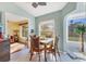 Inviting breakfast nook with views of the lake and outdoor landscape at 109 Southampton N Pl # 245, Venice, FL 34293