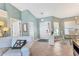 Bright, open living space with tile floors, comfortable seating, and inviting decor creating a relaxing atmosphere at 109 Southampton N Pl # 245, Venice, FL 34293