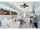 Bright living area with stylish seating, modern decor, and an open layout ideal for entertaining and relaxation at 109 Southampton N Pl # 245, Venice, FL 34293