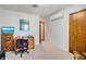 Functional bedroom featuring a desk and a tv at 1110 Gladstone Blvd, Englewood, FL 34223