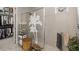 Elegant glass-enclosed shower with decorative etching and spa-like atmosphere at 11655 Renaissance Blvd, Venice, FL 34293