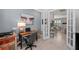Office space with shutters, wood desk, and decoratives at 13032 Oriago St, Venice, FL 34293