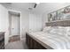 A cozy bedroom showcasing a sliding door closet and light gray decor at 13251 Borrego St, Venice, FL 34293