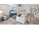 Cozy living room with a ceiling fan, recessed lighting, and stylish furnishings at 13251 Borrego St, Venice, FL 34293