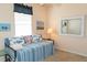 Bedroom featuring nautical themed bedding and decor, and bright natural lighting at 14 Windward Ter, Placida, FL 33946