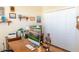 Bright home office featuring a large desk, closet, and decorations at 14 Windward Ter, Placida, FL 33946