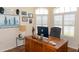Inviting home office featuring a desk and shuttered windows at 14 Windward Ter, Placida, FL 33946