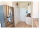 The kitchen features stainless steel appliances and access to the hall and laundry room at 14 Windward Ter, Placida, FL 33946