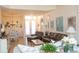 Comfortable living room featuring cozy seating, stylish decor, and plenty of natural light at 14 Windward Ter, Placida, FL 33946