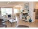 Spacious living room showcasing modern TV, comfortable sofa, and airy atmosphere at 14 Windward Ter, Placida, FL 33946