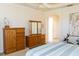Spacious main bedroom featuring neutral paint, carpeted floors, and wood furniture set at 14 Windward Ter, Placida, FL 33946