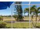Enjoy the outdoor views from the comfort of a screened lanai overlooking a well-manicured lawn at 14 Windward Ter, Placida, FL 33946