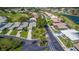 Picture perfect aerial view of homes in a community near a golf course and lakes at 1400 Colony Pl, Venice, FL 34292