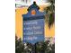 Informative Venice city sign points towards the beach, theatre, campus and fishing pier at 1400 Colony Pl, Venice, FL 34292