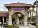 The Daiquiri Deck Raw Bar features a covered entrance and lush landscaping at 1400 Colony Pl, Venice, FL 34292