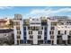 Modern townhouse complex featuring multi-story living and contemporary design elements at 1558 4Th St # 208, Sarasota, FL 34236