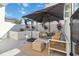 Chic outdoor patio featuring comfortable seating and lush tropical plants create an inviting lounge area at 1558 4Th St # 208, Sarasota, FL 34236