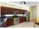 Well-equipped kitchen featuring stainless steel appliances and plenty of cabinet space at 1567 Monarch Dr, Venice, FL 34293