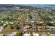 Aerial neighborhood view; quiet streets, green lawns, perfectly positioned to access the waterways and coast at 1600 Maryknoll Rd, Englewood, FL 34223