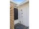 Outdoor shower with decorative wood screen on a concrete slab patio at 1600 Maryknoll Rd, Englewood, FL 34223