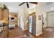 Open-concept kitchen with stainless appliances, breakfast nook and seamless flow to other living areas at 1627 Lancashire Dr, Venice, FL 34293