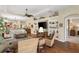 Spacious living room featuring built-in shelving and an open floor plan at 1627 Lancashire Dr, Venice, FL 34293