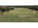 Expansive driving range offers a premier golfing experience with well-maintained fairways and lush green surroundings at 1853 San Silvestro Dr, Venice, FL 34285