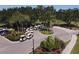 Well-maintained golf carts ready for players amidst verdant landscaping creating an inviting and upscale golfing environment at 1853 San Silvestro Dr, Venice, FL 34285