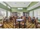 Clubhouse library featuring a variety of books and reading material with tables and chairs at 1853 San Silvestro Dr, Venice, FL 34285